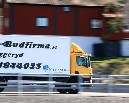 truck-yellow-way-courier-service-house